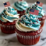 Bright, swirled frosting atop Star-Spangled Banner Cupcakes, ready for parties.