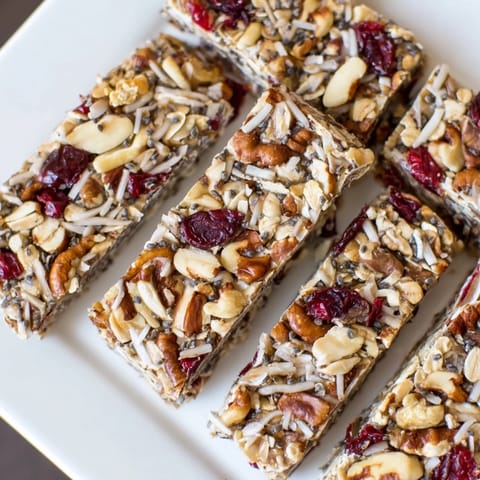 Golden-brown No-Bake Energy Bars, studded with nuts and fruit, are a perfect grab-and-go snack.